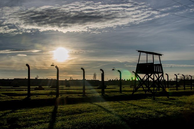 Auschwitz Birkenau Guided Tour with Ticket Hotel Pickup Small Van - Entering Auschwitz I with the museum guide