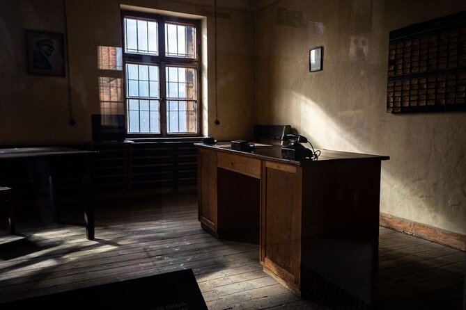 Auschwitz Birkenau Tour with Pickup and Lunch - Auschwitz I and the gate at the start