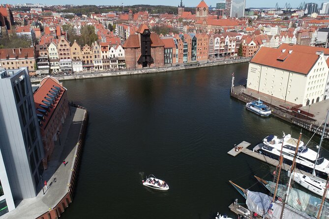 Cruises on the Motlawa River - Churches, towers, and the brick church behind St. John’s
