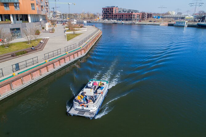 Cruises on the Motlawa River by a luxury catamaran - Gdańsk from the water side - Boarding at the Green Bridge