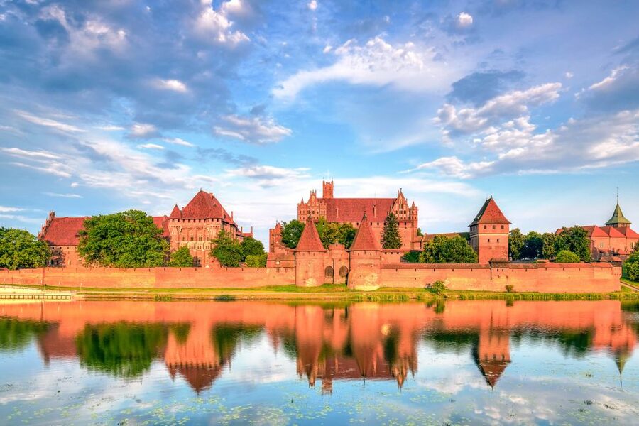 From Gdansk: Malbork Castle Half-Day Private Tour - First view of Malbork’s red-brick walls