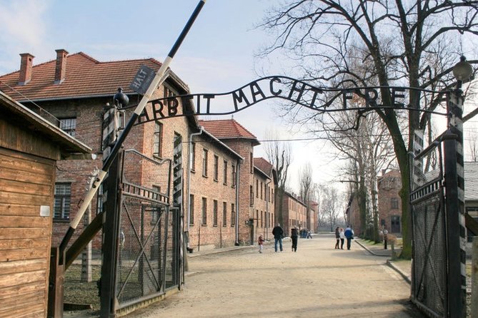 From Krakow: Auschwitz & Wieliczka Salt Mine Guided Tour - Transport, group changes, and the real pace of the day