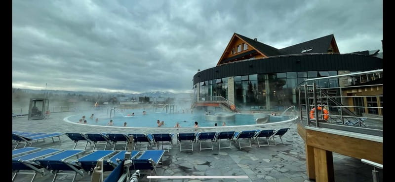 From Krakow: Snowmobile, Zakopane & Chochołowskie Baths - Thermal baths with the Tatra mountains nearby