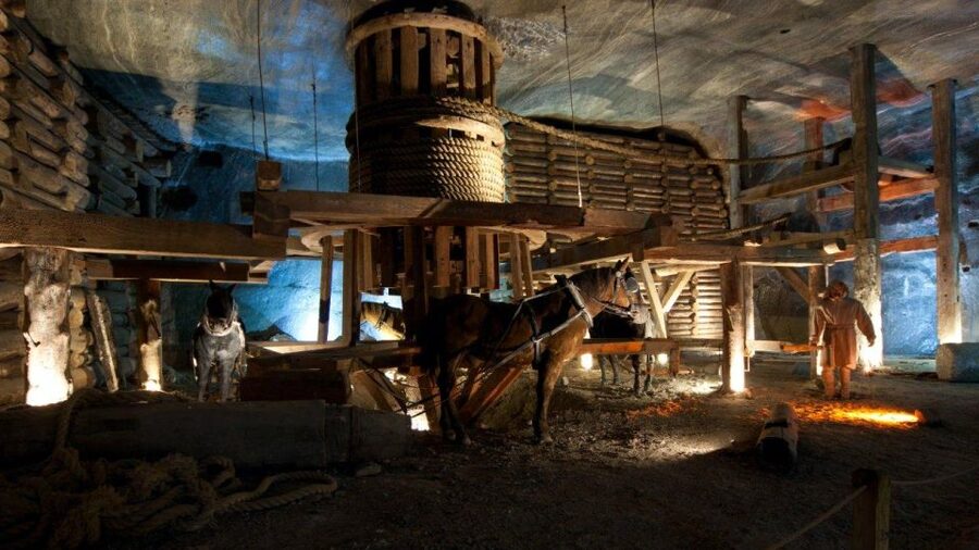 From Krakow: Wieliczka Salt Mine Guided Tour & Transfer - Salt extraction, carved chambers, and miner-made art