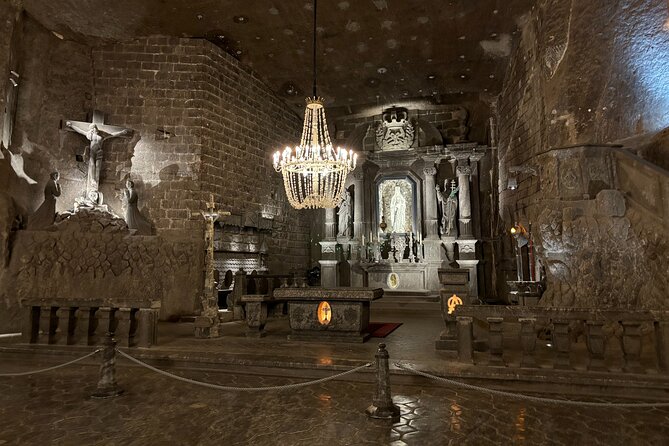 From Krakow: Wieliczka Salt Mine Guided Tour with Hotel Transfers - The Chambers, Carvings, and Stories Underground