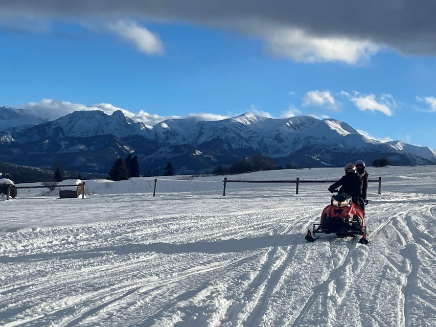 From Krakow: Zakopane Snowmobile NIGHT Ride, Bonfire, - Oscypek, mulled wine, and a real fire
