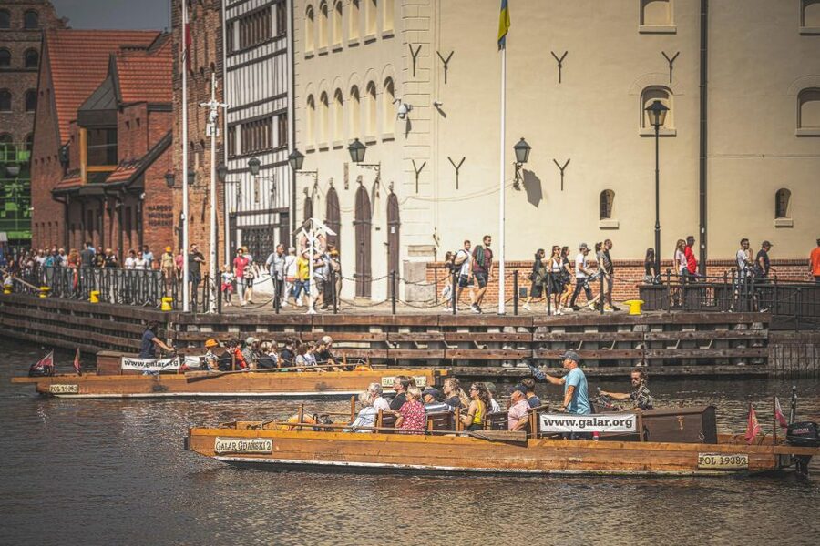 Gdansk: City Cruise on Historical Polish Boat - Shipyard cranes, submarines, and the working port