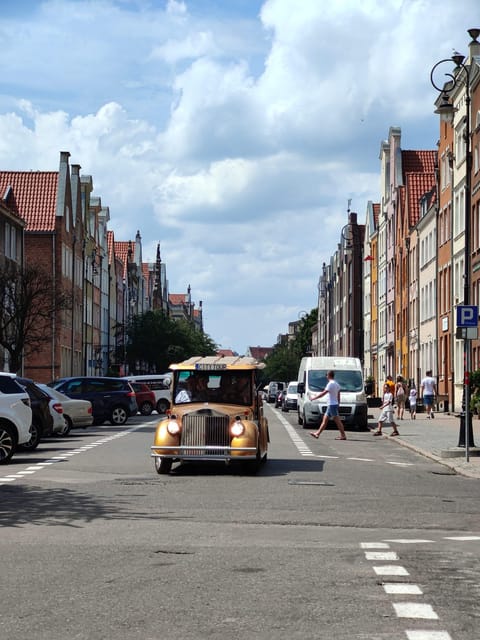 Gdansk: City Sightseeing Tour Eco Electric Buggy Golf Cart ! - Markets, mills, stations, and everyday city life