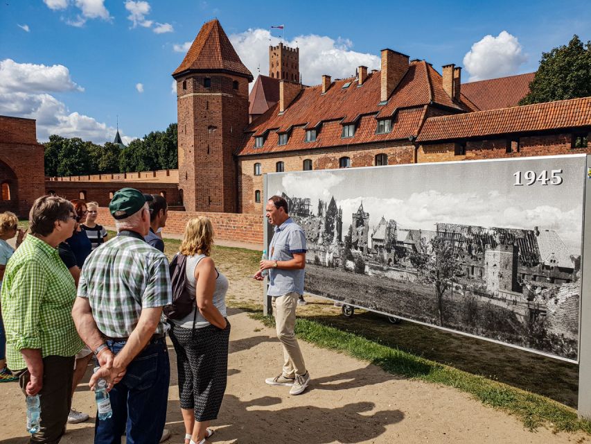 Gdansk: Malbork Castle & Westerplatte Tour with Local Lunch - Żuławy’s arcaded houses and Mennonite paths