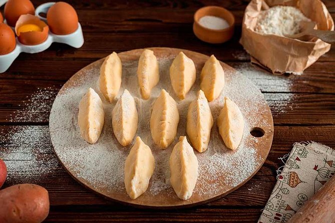 Half-Day Polish Food Walking Tour with Guide and Dinner - Pierogi, cabbage, pork, and sweet treats
