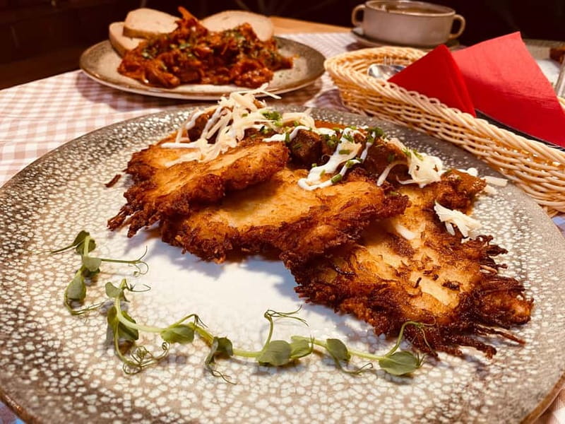 Krakow: 6-Course Full Polish Food Tour with Vodka Tasting - The first tastes: mountain cheese and Polish starters