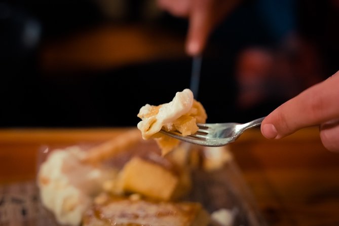 Krakow: 6-Course Full Polish Food & Vodka Tour - Beef stew, potato pancakes, and a hearty middle course