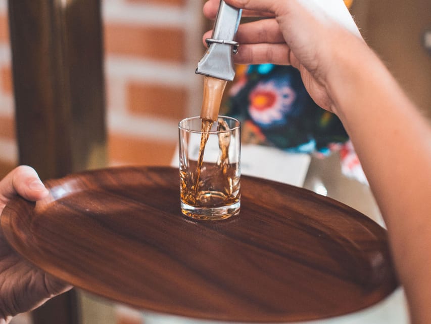 Kraków: Guided Vodka Tour with Food and Drink Tastings - The flavored vodkas: cherry, warmth, and plenty of choice
