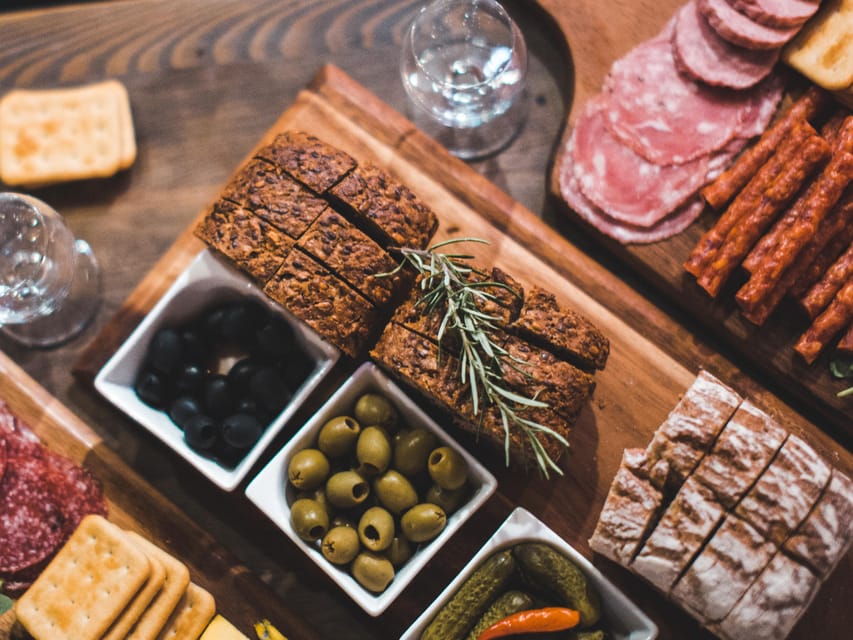 Kraków: Guided Vodka Tour with Food and Drink Tastings - Walking Kraków’s Old Town between the tastings