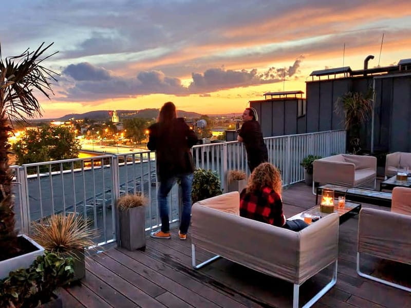 Krakow: Hidden Rooftop Bar Reservation with 1 Cocktail - The sixth-floor terrace and its city view