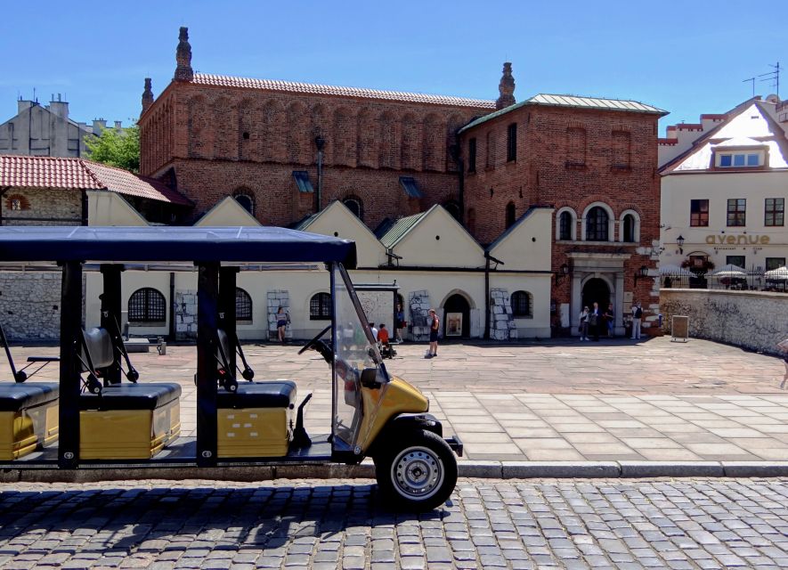 Krakow: Jewish Quarter and Former Ghetto Tour by Golf Cart - The Eagle Pharmacy and traces of the ghetto wall