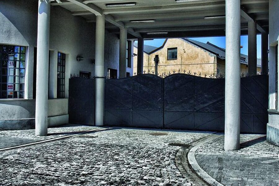 Krakow: Oskar Schindler's Factory Guided Tour&Pickup Options - Narrow Rooms and the Feeling of Occupied Kraków