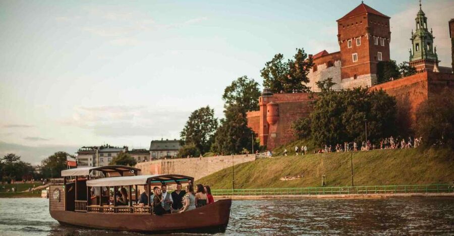 Krakow: Private Traditional Gondola Cruise - Getting onto the covered wooden gondola