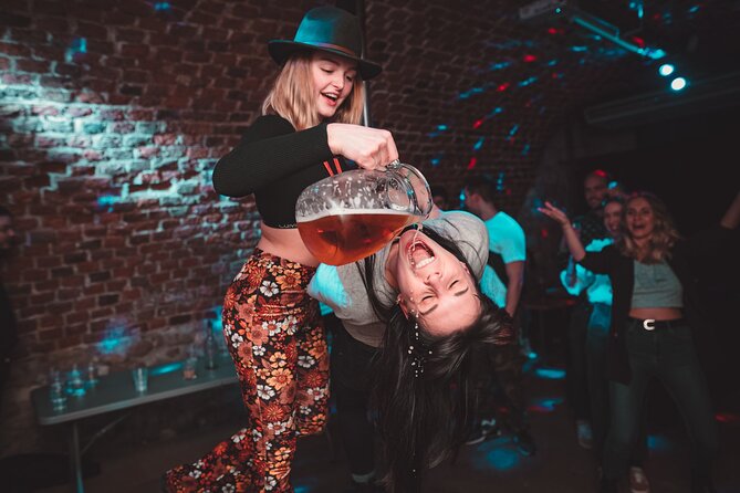 Krakow Pub Crawl with 1 Hr of unlimited alcohol & 4 clubs/pubs - The first hour: drinks, games, and a fast social start