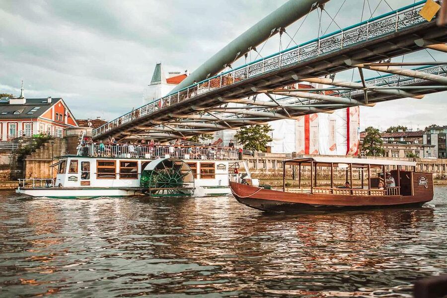 Krakow: Sightseeing Cruise by Vistula River - Open deck, seating, and weather