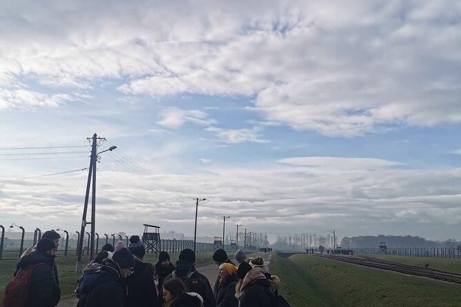 Krakow to Auschwitz Birkenau Guided Tour with Transfer and Ticket - Birkenau: scale, open ground, and silence