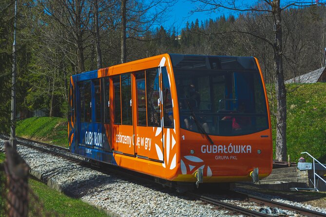 Krakow to Zakopane: Funicular, Tasting and Thermal Baths Day Trip - Transport, guides, and group size