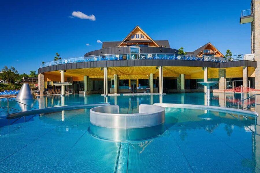 Krakow: Zakopane and Thermal Pools Tour with Hotel Pickup - Chochołowskie Thermal Baths after dark