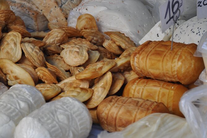 Pierogi Cooking Class with Market Shopping and Local Snacks - Shopping for cheese, sausage, and Polish snacks