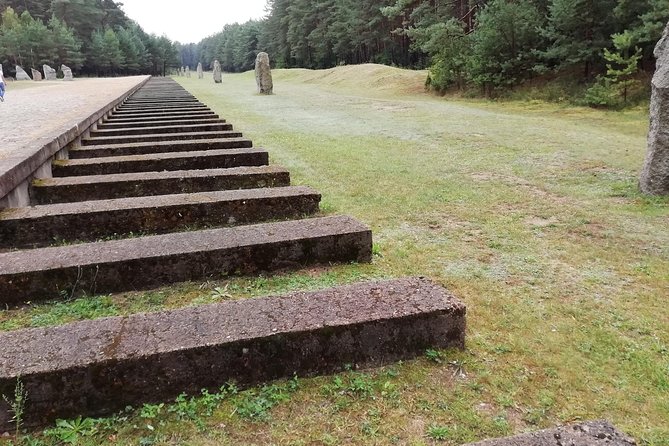 Private half-day tour to Treblinka with hotel pickup - Walking through the Treblinka II memorial