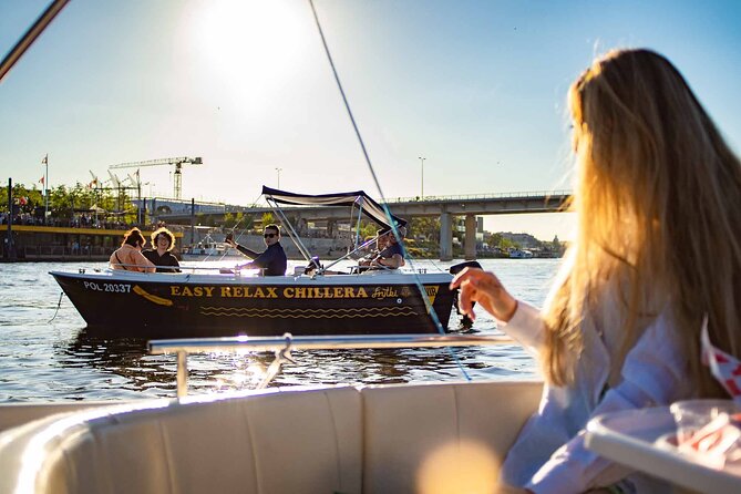 Rental of Motorboat for 5 on Vistula in Warsaw no Licenses Needed - The city looks different from the water
