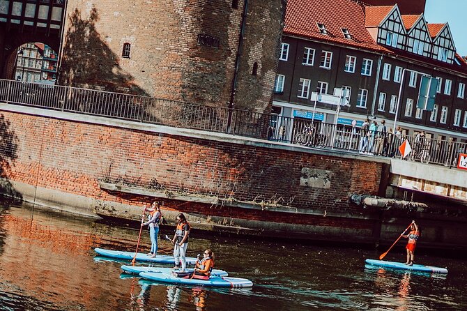 SUP Private Tour in Motlawa River - Meeting SS Soldek, Poland’s first postwar ship
