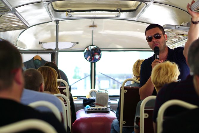 Warsaw City Sightseeing in a Retro Bus - Starting beneath Warsaw’s Palace of Culture