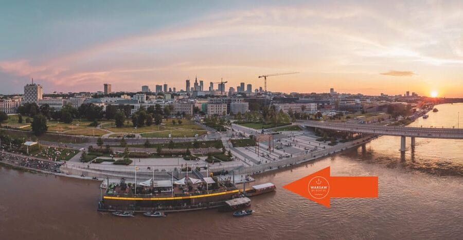 Warsaw: Evening Vistula Cruise with Welcome Drink - The return past Poniatówka and the National Stadium